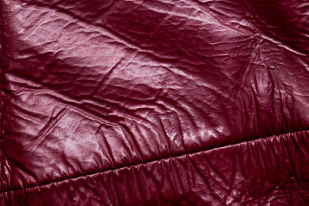 Close-up of a red leather texture background.