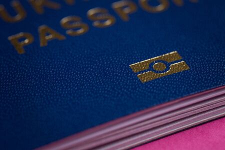 Blue biometric passport closeup. Biometrics sign shot on macro.の写真素材