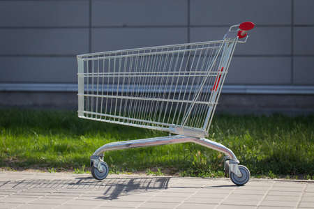 An empty cart for products near the supermarketの写真素材