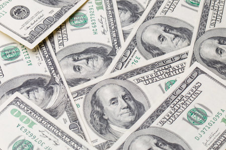 Texture of dollar bills. One hundred dollars.