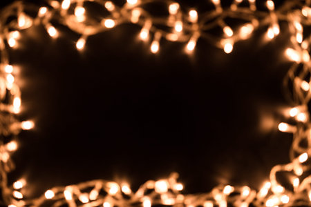 Blurry christmas lights. Christmas lights border. Christmas background with lights and free text...