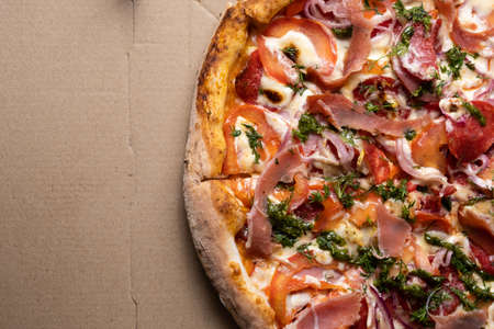Delicious juicy pizza close-up. View from above.の写真素材