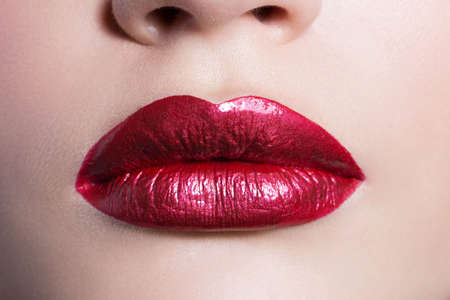 Sexy female claret lips, close-up. Studio photography.の写真素材
