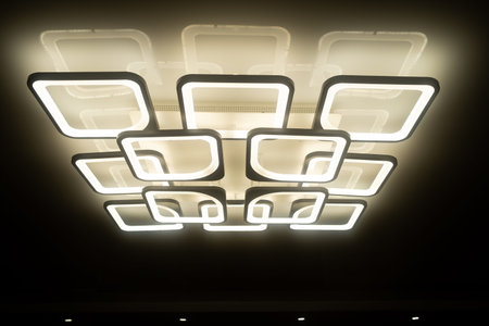 Led lamps built into the ceiling glowing in the dark