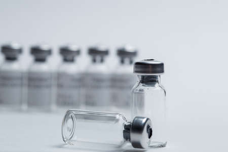 vial and syringe for vaccine on white background closeupの写真素材