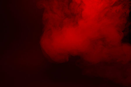 Colorful smoke close-up on a black background