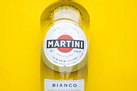 Ukraine, Kyiv - February 2, 2022: Martini bottle on yellow background top view.のeditorial素材