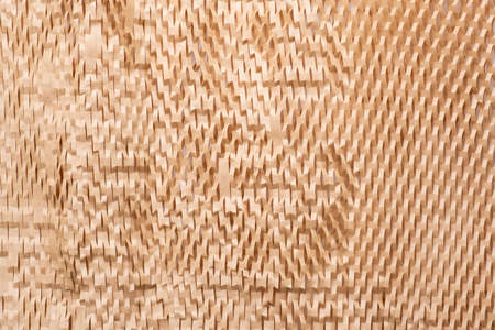 Texture of perforated paper and cardboard.の写真素材