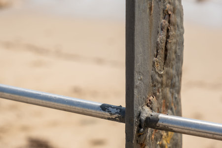 Corrosive rusty bolt close-up. Wood and metal are susceptible to rust