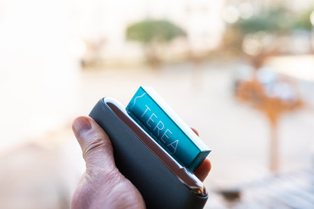 Tarragona, Spain - January 26, 2023: Phillip Morris Internationals Marlboro IQOS, electronic cigarette. New pack terea.のeditorial素材