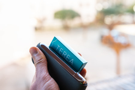 Tarragona, Spain - January 26, 2023: Phillip Morris Internationals Marlboro IQOS, electronic cigarette. New pack terea.のeditorial素材