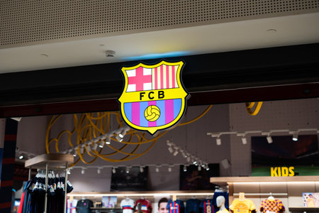Tarragona, Spain - February 08 2023: Barcelona football club logo in store.のeditorial素材