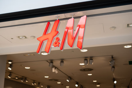 Tarragona, Spain - February 08 2023: HM shop sign.のeditorial素材
