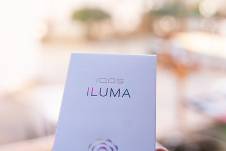 Tarragona, Spain - January 26, 2023: Phillip Morris Internationals Marlboro IQOS, electronic cigarette. Box new iluma.のeditorial素材