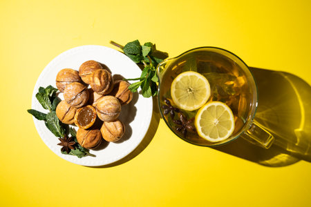 Homemade nut cookies with condensed milk on a yellow background.の写真素材