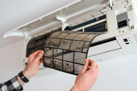 Air conditioner filter dusty. Preparation for maintenance and cleaning.の写真素材