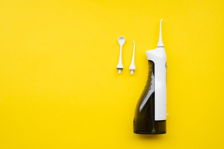 Mouth aerator on a yellow background with different nozzles. View from aboveの写真素材