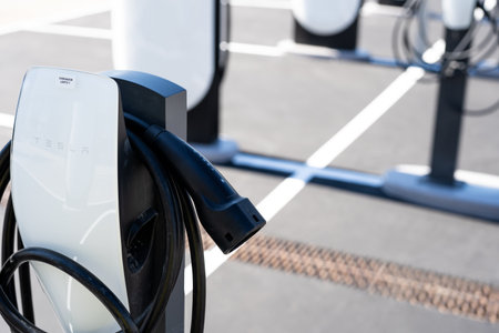 Tarragona, Spain - September 27, 2023: Electric car charging station Tesla Supercharger.のeditorial素材