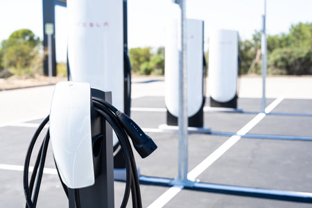 Tarragona, Spain - September 27, 2023: Electric car charging station Tesla Supercharger.のeditorial素材