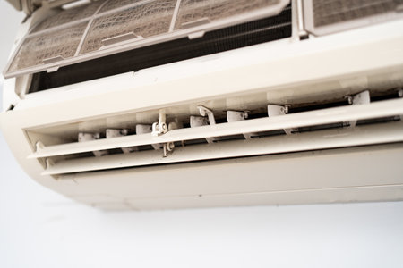 Mold on air conditioner close-up. Air conditioner maintenance and cleaning.の写真素材