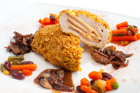 Slised chiken cutlet with ham and cheeseの写真素材