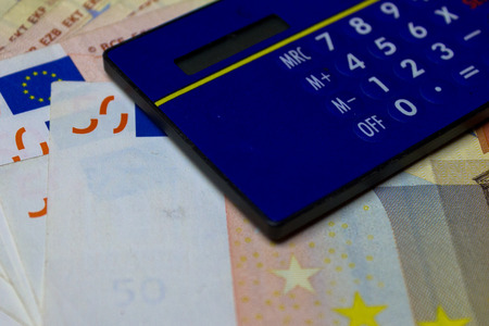 calculator with currency notesの写真素材