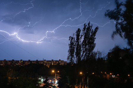 thunderstorm in the city in the night thunderboltの写真素材
