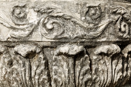 Stone urn on the background of the castle wall close upの写真素材