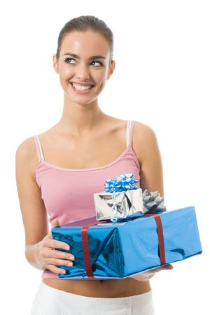 Young happy smiling woman with gift boxes, isolated on whiteの写真素材