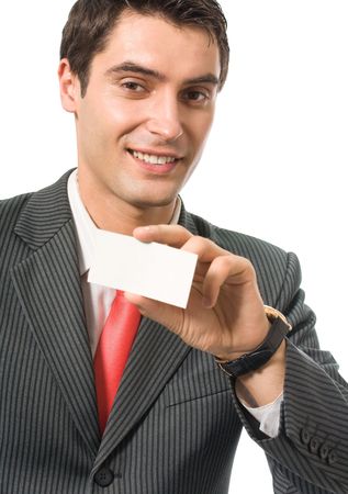 Young happy smiling businessman giving business-card, isolated on whiteの写真素材