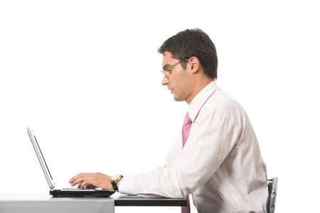 Businessman working with laptop at office, isolated on whiteの写真素材
