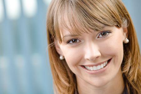 Portrait of happy businesswoman at officeの写真素材