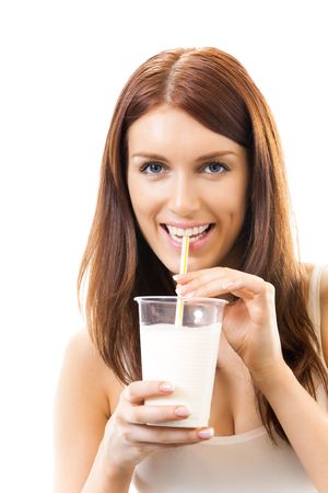 Portrait of young woman drinking milk, isolated on whiteの写真素材