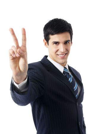 Happy businessman showing two fingers, isolated on whiteの写真素材
