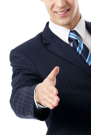 Businessman giving hand for handshake, isolated on whiteの写真素材