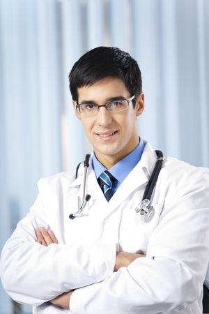 Portrait smiling doctor at officeの写真素材