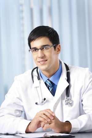 Portrait of smiling doctor at officeの写真素材
