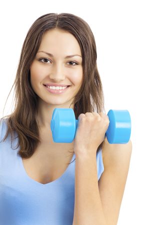 Young woman in sportswear with dumbbell, isolated on whiteの写真素材