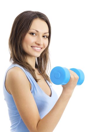 Young woman in sportswear with dumbbell, isolated on whiteの写真素材