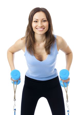 Woman doing exercises with dumbbells and expander, isolated on whiteの写真素材