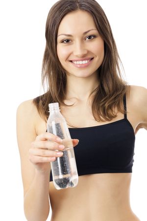 Woman in sportswear drinking water, isolated on whiteの写真素材