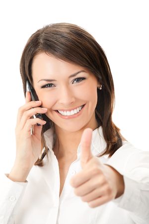 Happy smiling successful businesswoman with cell phone and thumbs up gesture, isolated on white backgroundの写真素材