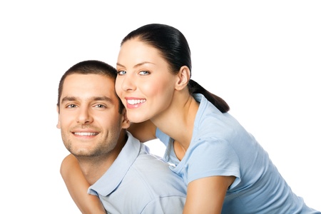 Portrait of young happy smiling attractive couple, isolated on white backgroundの写真素材