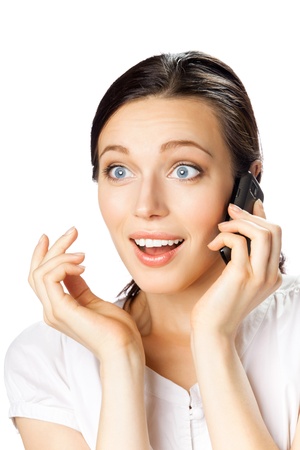 Happy smiling successful businesswoman with cell phone, isolated on white backgroundの写真素材