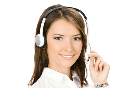 Portrait of happy smiling cheerful beautiful young customer support phone operator in headset, isolated over white backgroundの写真素材