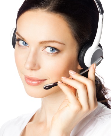 Portrait of happy smiling cheerful beautiful young support phone operator in headset, isolated over white backgroundの写真素材