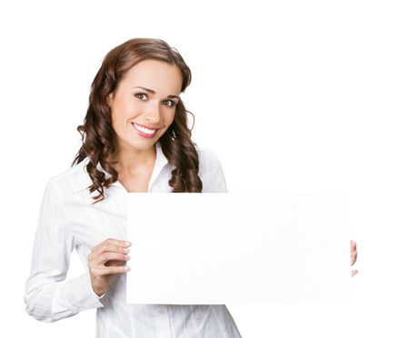 Happy smiling young business woman showing blank signboard, placard or banner, isolated over white backgroundの写真素材