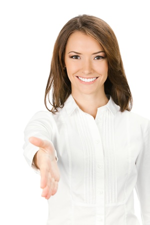 Happy smiling young beautiful business woman giving hand for handshake, isolated over white backgroundの写真素材