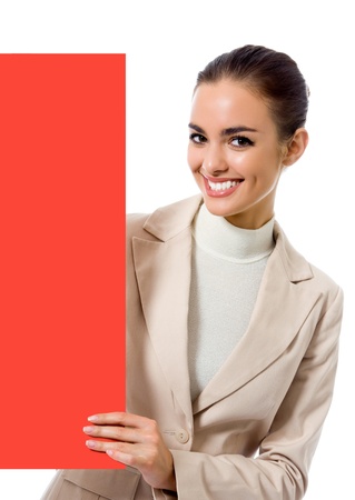 Happy young business woman showing blank red signboard, isolated over white backgroundの写真素材