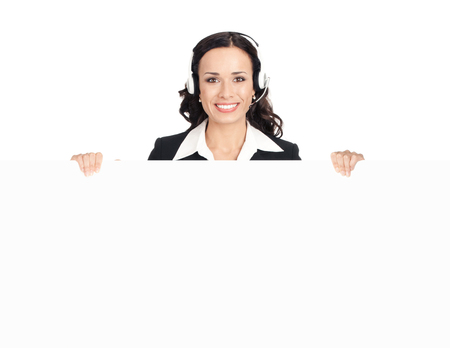Happy smiling beautiful support phone operator in headset, isolated against white background. Copyspace blank area for some advertise, slogan or text.の写真素材